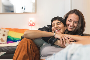 Lesbian couple at home enjoying life together - 478396720