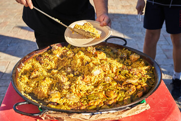 Valencian paella with chicken and rabbit
