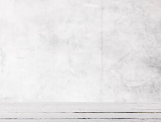 Empty light gray background with white rustik wooden table for product presentation