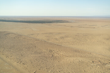Fototapeta na wymiar Aerial view of the desert, tozeur and its palm grove- western Tunisia - Tunisia