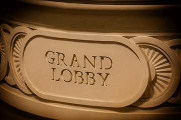 Stone Grand Lobby sign on a cruise ship, located in the atrium, atmospheric natural plaque with a vignette. - 478400944