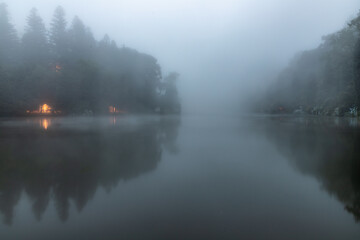 Lago Negro lake with fog, lights and reflection