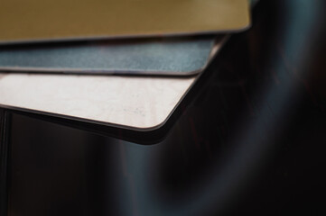 Pile of card, credit cards on the table. shallow focus in soft tone.