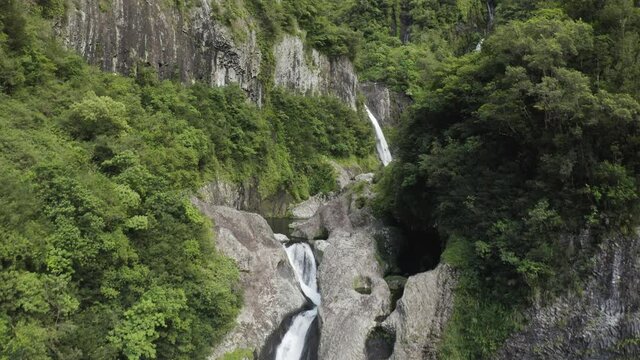 Aerial view of Cascada de L'arc en Ciel, a beautiful waterfall on Canton de Saint Benoit, Reunion.