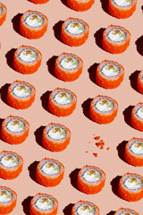 fresh traditional Japanese sushi rolls on a bright background