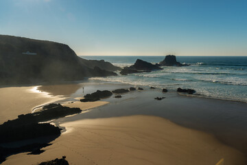 sunset over the zambujeira do mar beach in Portugal