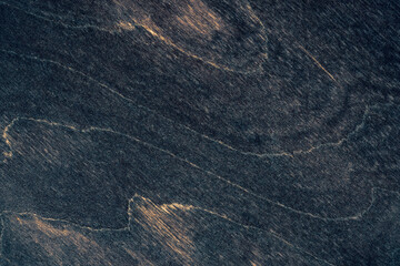 Dark brown wood with a rough surface for texture and background. Wood black table. Vintage texture...