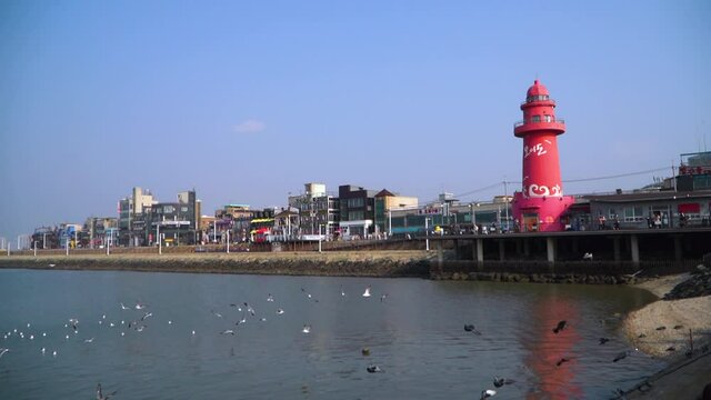 siheung-si, gyeonggi - Nov 2021 : Dating trip on a drive course in the suburbs of seoul red lighthouse in oido, siheung-si, gyeonggi-do