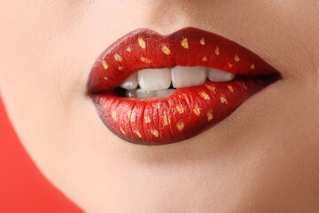 Fototapeta premium Beautiful young woman with unusual makeup, closeup