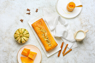 Plate with tasty pumpkin pie on light background