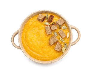 Pot of tasty pumpkin cream soup on white background