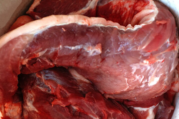 Defocus texture or background of tasty fresh meat of big, pork. Red beef meat close up texture....