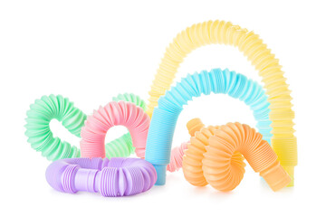 Different colorful Pop Tubes on white background