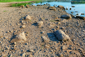 Rocks on the river bank . Riverside during the drought