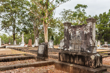 Fototapeta na wymiar Historic graves at Hemmant Cemetery, Queensland