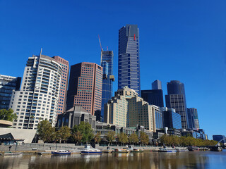 Fototapeta na wymiar Melbourne city Victoria Australia,Yarra river and building view with blue sky.