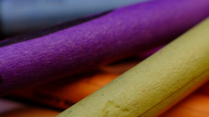 Close up shots of colorful crayons in macro