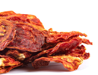 Sun-dried tomatoes on a white background.