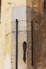Description of medieval measures of length on the wall of the town hall ("city shoe", "elbow" and "flywheel fathom") Regensburg, Bavaria, Germany