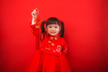 A girl celebrates Chinese New Year with a Chinese knot