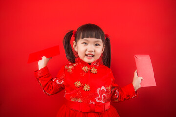 A girl celebrates Chinese New Year with a Chinese knot