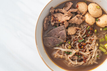 Thai noodle with pork, stewed pork, meatball and pork liver in blood soup
