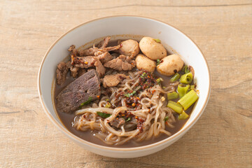 Thai noodle with pork, stewed pork, meatball and pork liver in blood soup