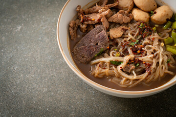 Thai noodle with pork, stewed pork, meatball and pork liver in blood soup