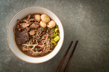 Thai noodle with pork, stewed pork, meatball and pork liver in blood soup