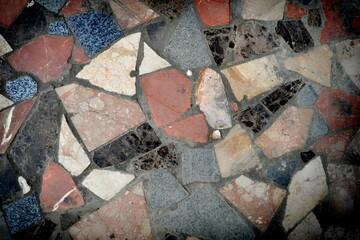 Colorful stone mosaic with chaotic pattern, seamless background photo texture