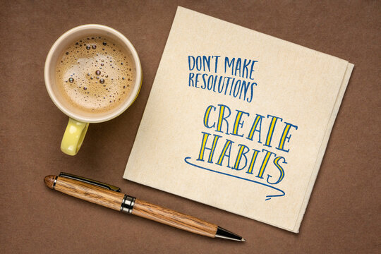 do not make resolutions, create habits -  inspirational advice or reminder on a napkin, New Year resolutions, setting goals and personal development concept