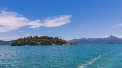 Fototapeta premium Island under blue sky in blue sea