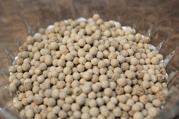White pepper on a glass bowl