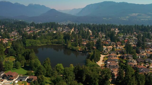 Scenic aerial view over Como Lake Park in Coquitlam, Greater Vancouver, British Columbia.