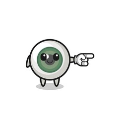 eyeball mascot with pointing right gesture