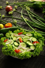 Homemade delicious vegan diet foods- fresh harvested organic cucumber salad.