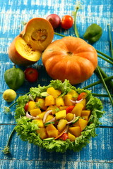 Healthy vegan diet eating- homemade delicious organic pumpkin salad.