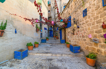 Colorful street in the old town of Mardin, Turkey