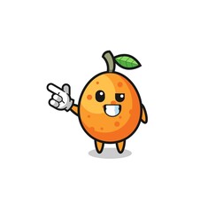 kumquat mascot pointing top left