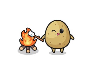 Obraz premium potato character is burning marshmallow