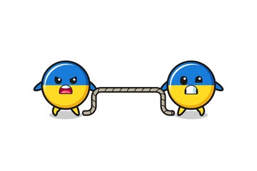 cute ukraine flag character is playing tug of war game