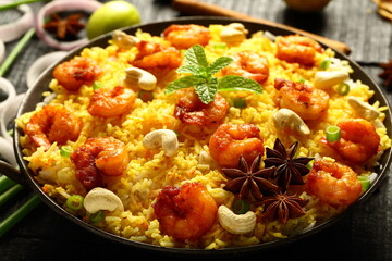 Indian street foods- spicy seafood fried rice with prawns and shrimps.