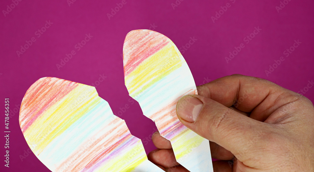 Poster colorful paper heart in hands