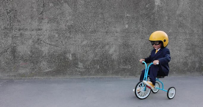 Funny businessman driving retro trike outdoor. Slow motion 4K