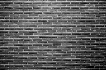 Fototapeta na wymiar Black brick wall dark background