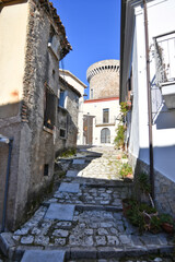 A small street between the old houses of Picerno, a small town in the province of Potenza in Basilicata, Italy.
