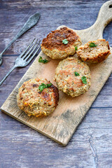 Home made  fried meatballs   on wooden rustic background.Cutlets from beef and pork meat.