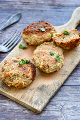 Home made  fried meatballs   on wooden rustic background.Cutlets from beef and pork meat.