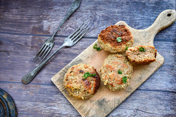 Home made  fried meatballs   on wooden rustic background.Cutlets from beef and pork meat.