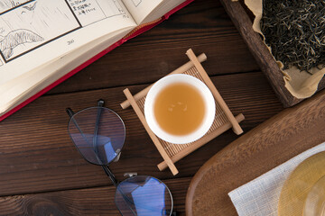 A bowl of Gongfu tea and other items